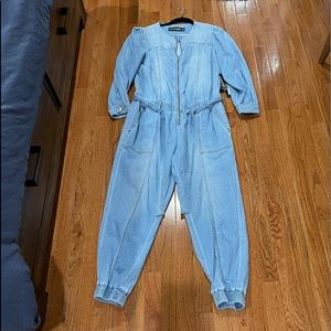 Brand new jogger jumpsuit, 56 inch long from top to bottom and 19 1/2 pit to pit